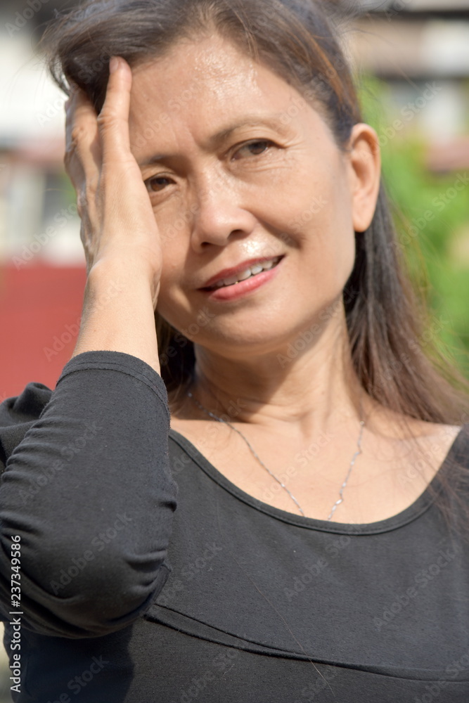 Thoughtful Filipina Female Senior Thoughtful Filipina Female Senior