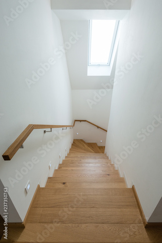 Detail of wooden stairway in modern house © ventura