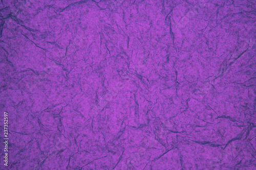 ABSTRACT RANDOM BACKGROUND OF CREASED CRUMPLED PURPLE TISSUE PAPER