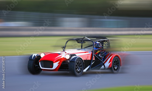 Race car racing at high speed