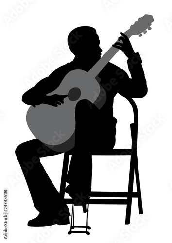 Young man acoustic guitar player. Classical music. 