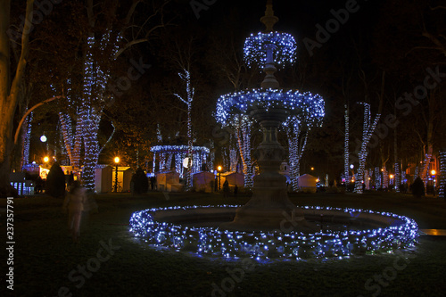 Advent in Zagreb - Zrinjevac park decorated by Christmas lights at the time of Advent photo