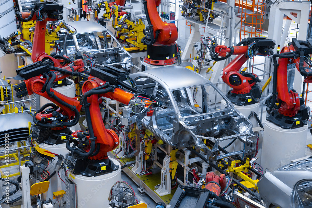 Automotive production line. Welding car body. Modern car Assembly plant - obrazy, fototapety, plakaty 