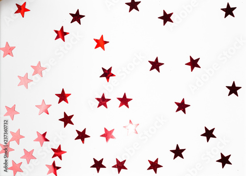 Group of red star decoration isolated on white background top view