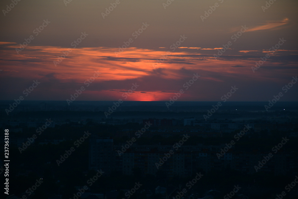 Fototapeta premium NIZHNY NOVGOROD, RUSSIA - AUGUST 28, 2018: Beautiful view to the sunset over Oka river in Park Shveytsariya in the Upper part of the city