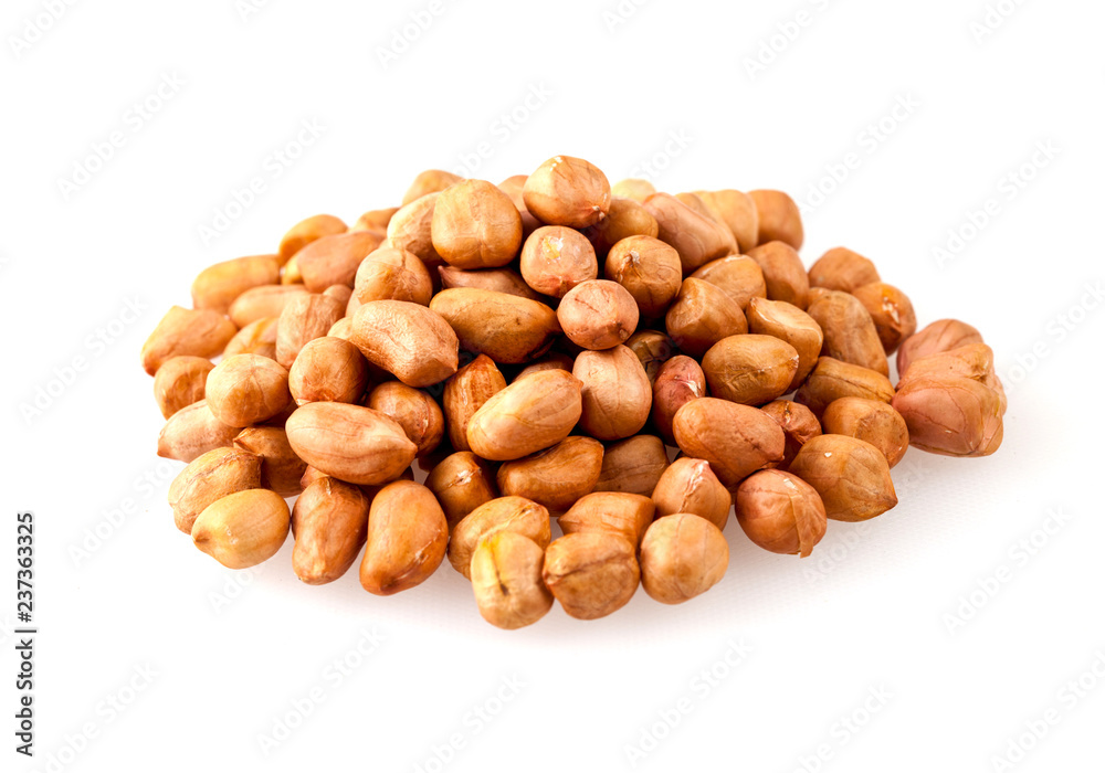 Unpeeled peanuts pile on white food ingredient natural Unpeeled peanuts pile on white food ingredient natural
