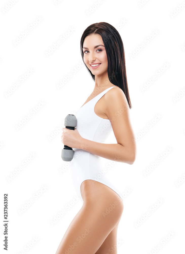 Fit and beautiful woman in swimsuit. Sporty girl with dumbbells. Fitness, diet and healthy lifestyle concept. Fit and beautiful woman in swimsuit. Sporty girl with dumbbells. Fitness, diet and healthy lifestyle concept.