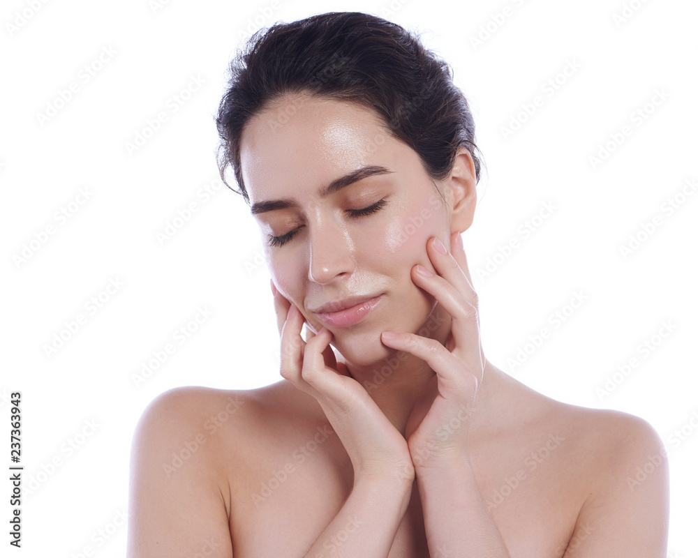 Beautiful face of young adult woman with clean fresh skin - isolated on white Beautiful face of young adult woman with clean fresh skin - isolated on white