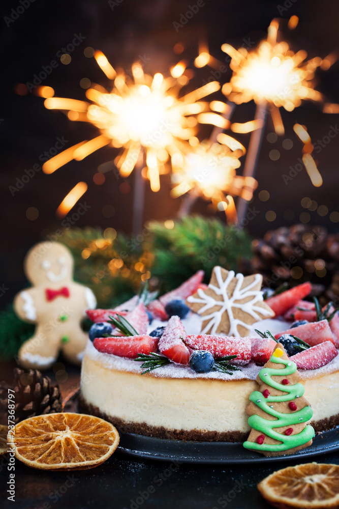 Delicious Christmas ginger cheesecake with fresh berries decoration