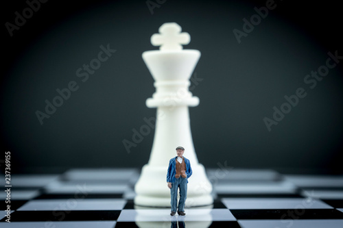 Man thumbnail within a game of chess  concept