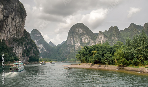 Cruise in the river Li between Guilin and Yangshuo. China. Landscape of Guilin, Li River and Karst mountains.