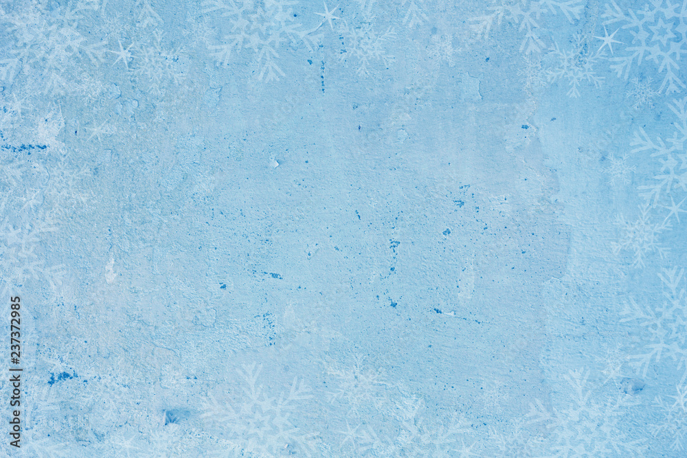Obraz premium Blue Christmas background with snowflakes