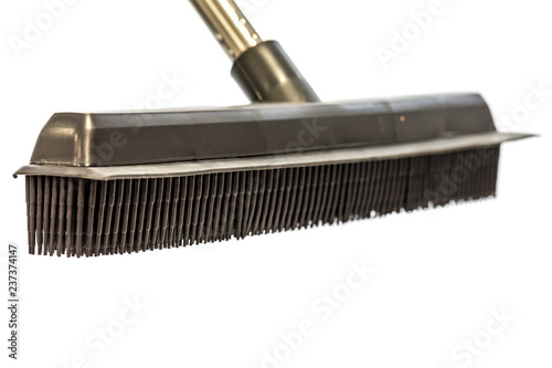 Black Rubber brush, with bristles for cleaning work, photograph with high key, white background