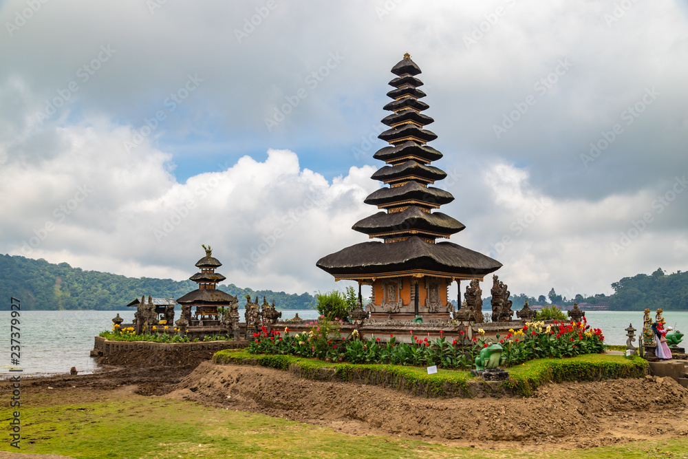 Pura Ulun Danu Beratan in cloudy day, famous temple on the lake, Bedugul, Bali, Indonesia.