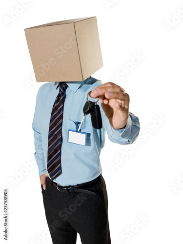 The man holds the keys to the car. On the head box. On a white background.