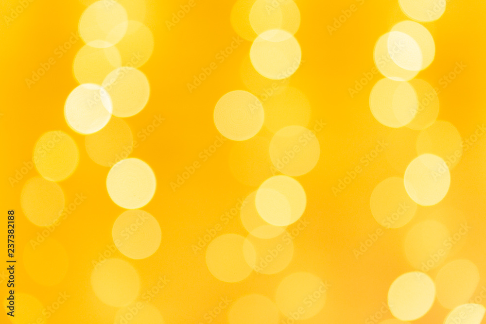 Bright bokeh on the background of Christmas trees and garlands background New Year 2019 year