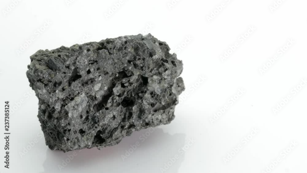 Lava is molten rock generated by geothermal energy and expelled through fractures in planetary crust or in an eruption, from Vesuvius volcano, isolated on a white background, Naples, Italy Lava is molten rock generated by geothermal energy and expelled through fractures in planetary crust or in an eruption, from Vesuvius volcano, isolated on a white background, Naples, Italy