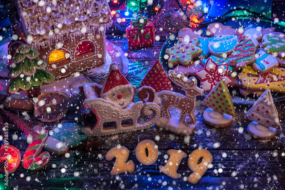 Gingerbread cookies with snow, 2019 new year, xmas theme Gingerbread cookies with snow, 2019 new year, xmas theme
