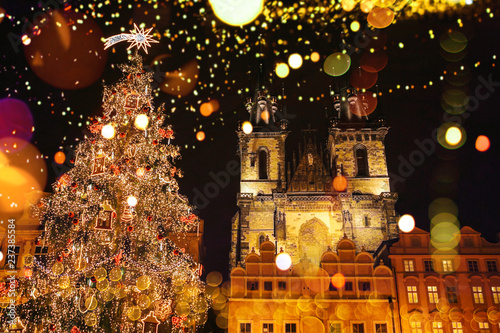 Photography Decorated Christmas tree stands on the main square in Prague during the New Year holidays