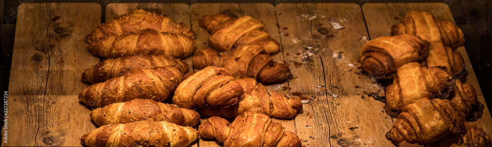 delicious croissants at the bakery on wood delicious croissants at the bakery on wood