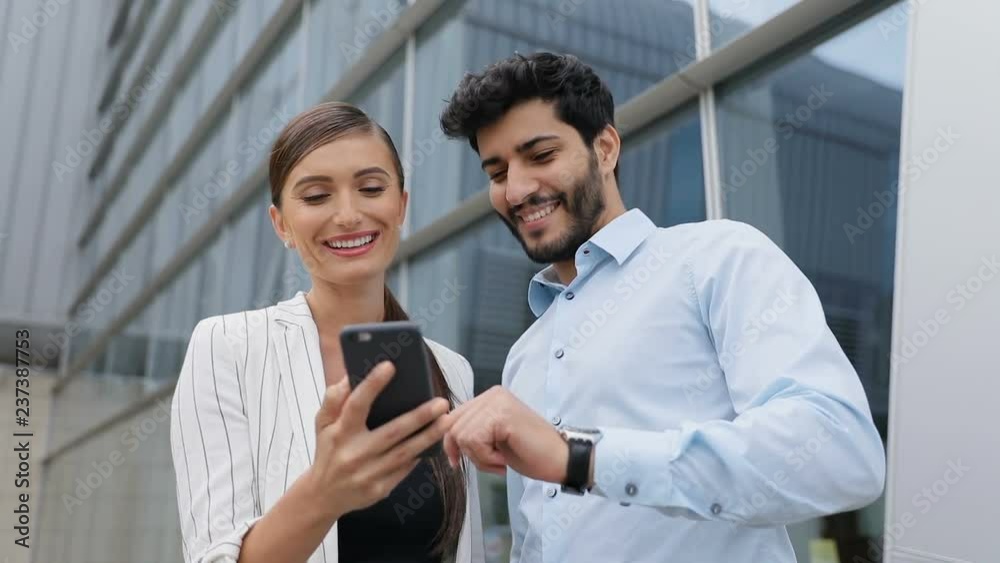 Business People Using Phone Near Office On Street Business People Using Phone Near Office On Street