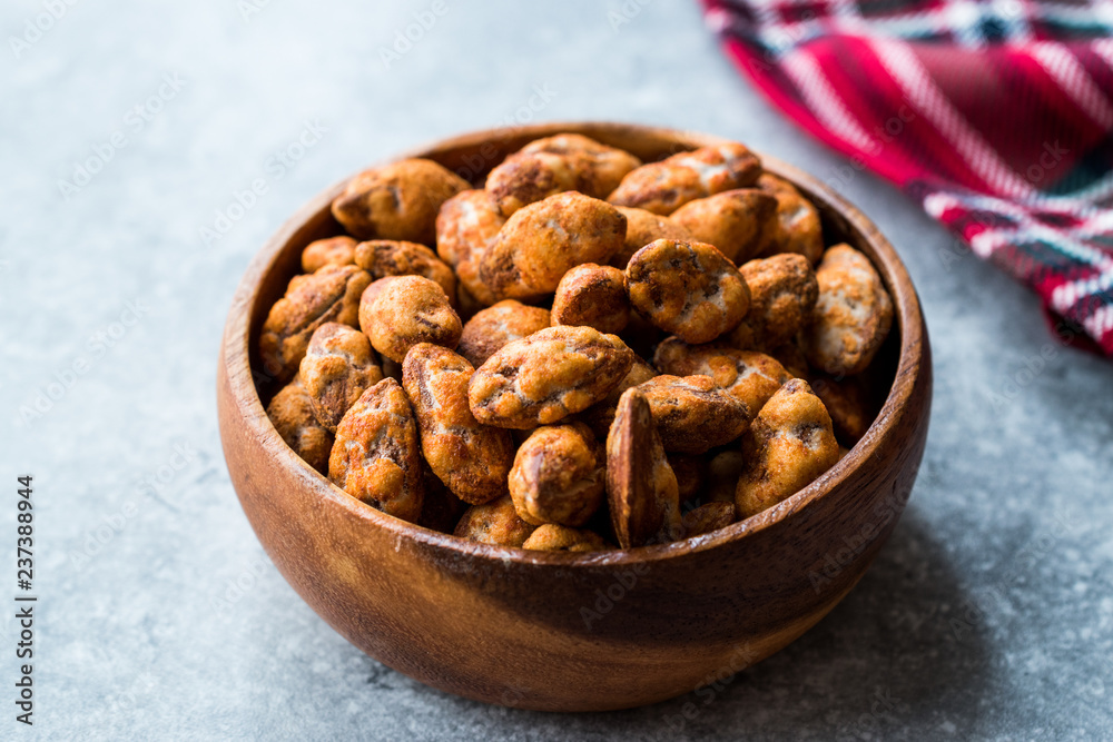 Almond Nuts with Barbeque Sauce in Wooden Bowl. Almond Nuts with Barbeque Sauce in Wooden Bowl.