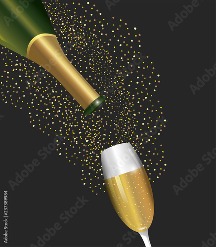 champagne bottle and glass to celebrate holiday photo