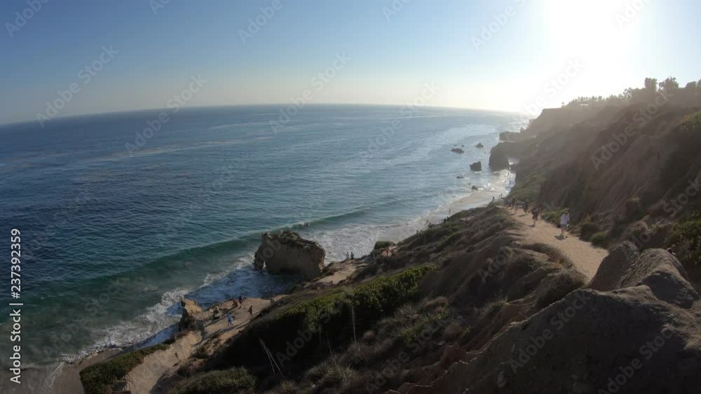 Panoramic view from coastal walk leading down to El Matador State Beach at sunlight. Pacific coast in California, United States. Pillars, boulders and rock formations of most photographed Malibu beach Panoramic view from coastal walk leading down to El Matador State Beach at sunlight. Pacific coast in California, United States. Pillars, boulders and rock formations of most photographed Malibu beach