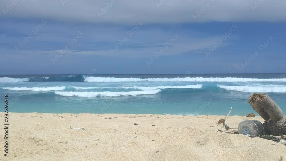 Trash on Bali beach, ocean view, Waves Trash on Bali beach, ocean view, Waves