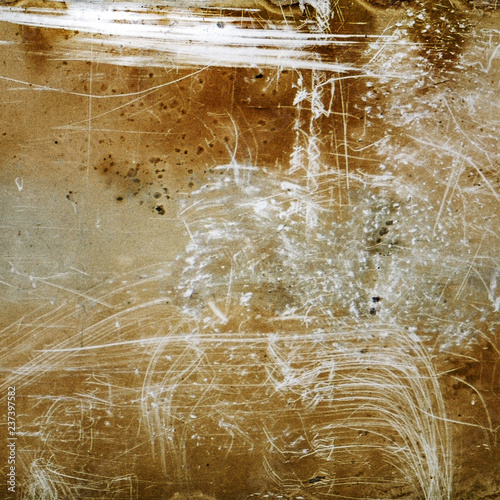 Brown grunge textured backg...