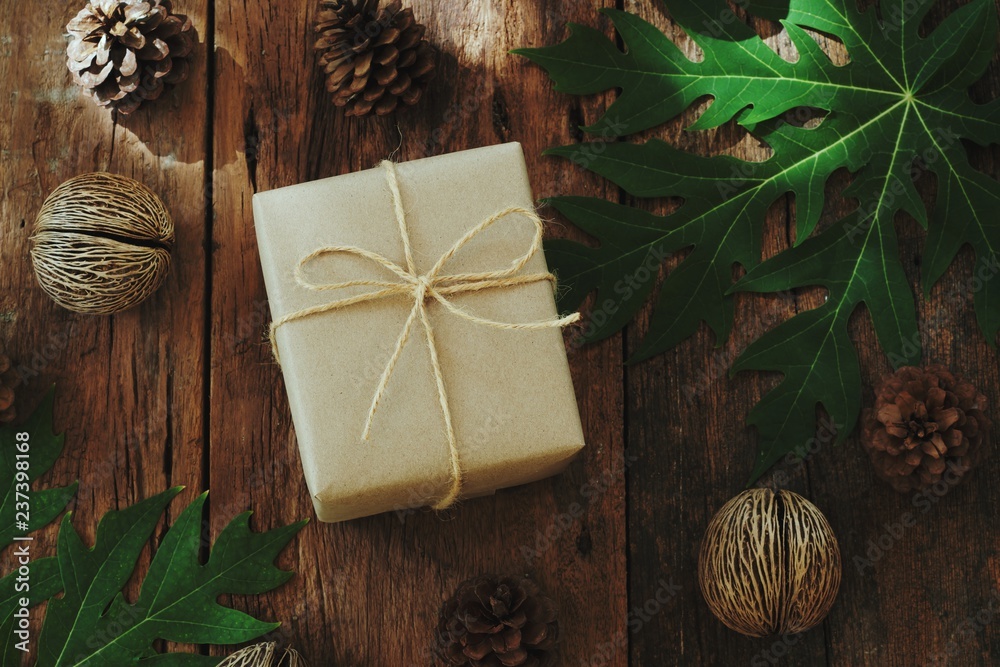 Eco friendly gift boxes wrapped with brown paper, green happy new year present concept Eco friendly gift boxes wrapped with brown paper, green happy new year present concept