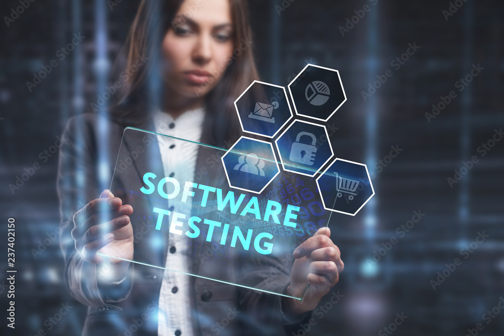The concept of business, technology, the Internet and the network. A young entrepreneur working on a virtual screen of the future and sees the inscription: Software testing The concept of business, technology, the Internet and the network. A young entrepreneur working on a virtual screen of the future and sees the inscription: Software testing