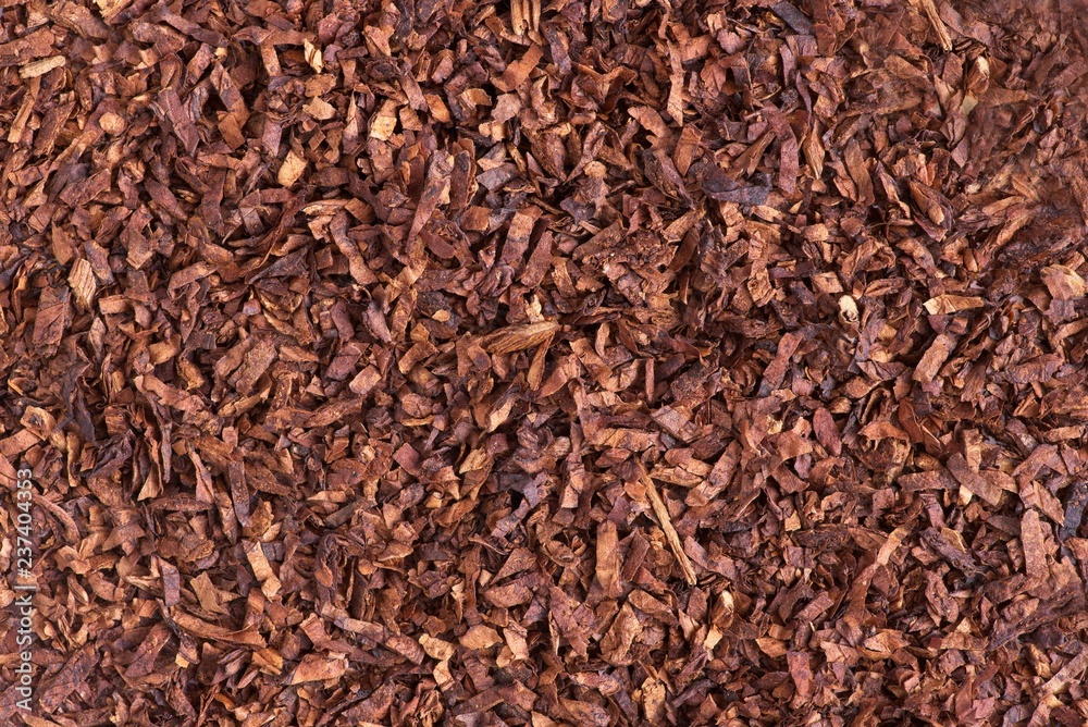 A closeup and detaild view of tobacco leave that have been crimp cut and ready for smoking. A closeup and detaild view of tobacco leave that have been crimp cut and ready for smoking.