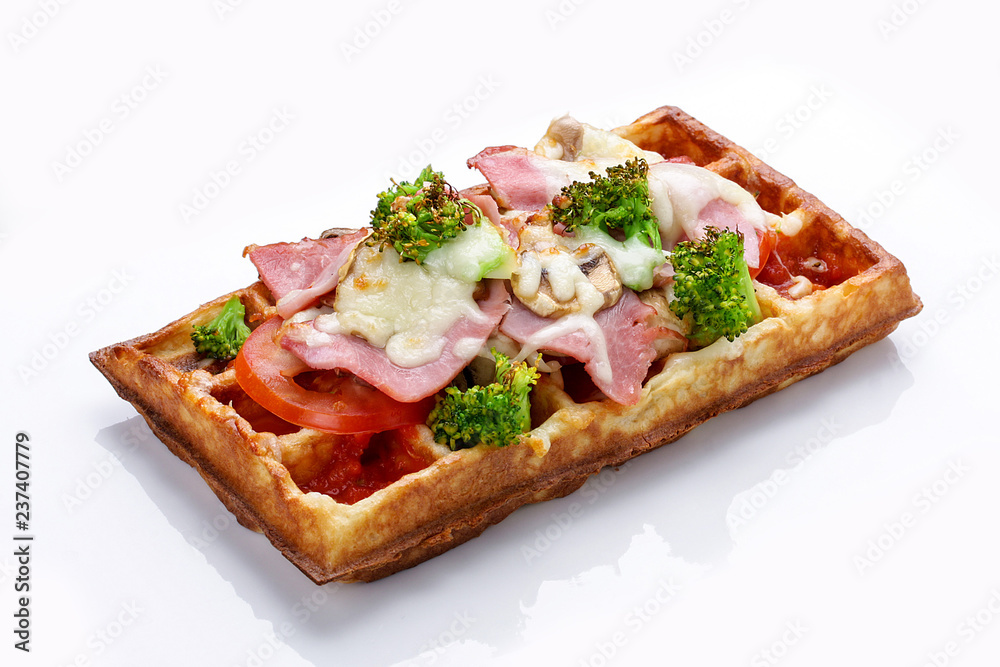 Belgian waffle on a white background. Stuffed with ham cheese and broccoli