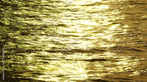 4K golden collor water natere texture backgound photo