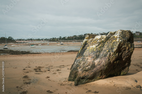 Fotografie Big rock at the beach at the low tide in Brittany