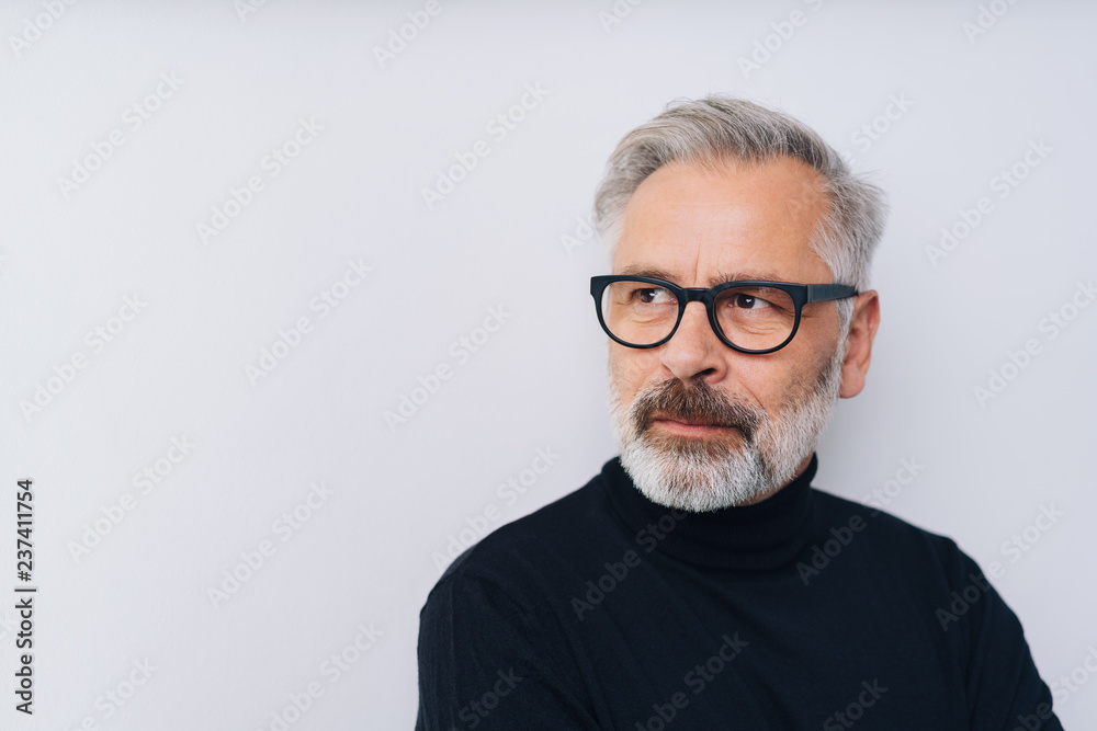 Middle-aged man thinking of future or planning
