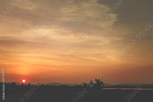 Sunset sky with siluate mountain. photo