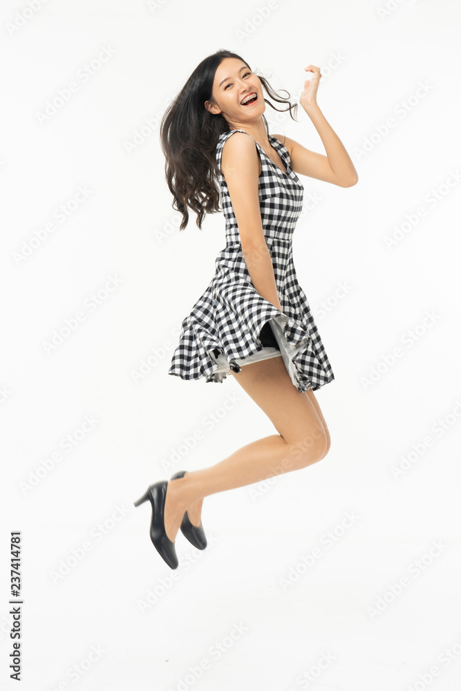 portrait of excited surprised attractive inspired girl jumping up isolated on background.Freedom legs stylish feet glamorous people teenager asian. portrait of excited surprised attractive inspired girl jumping up isolated on background.Freedom legs stylish feet glamorous people teenager asian.