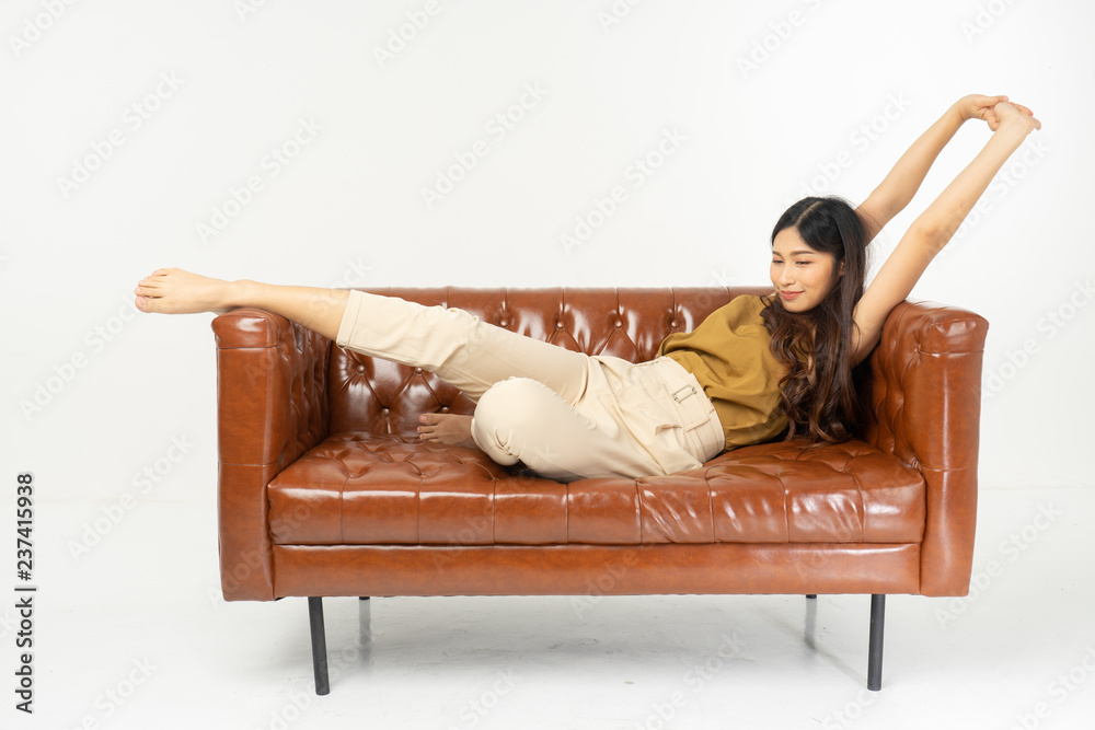 home, leisure, technology and happiness concept - smiling teenage girl  sitting on sofa with tablet .office synonym concept. Stock Photo | Adobe  Stock