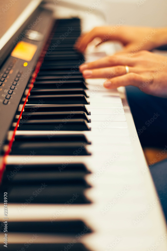 Fototapeta premium Playing the piano