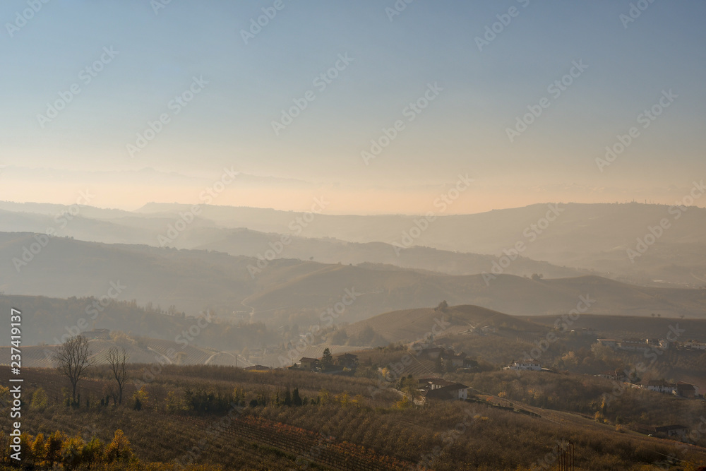 Panoramic view of Langhe hills at sunset in autumn, Piedmont, Italy