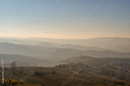 Panoramic view of Langhe hills at sunset in autumn, Piedmont, Italy
