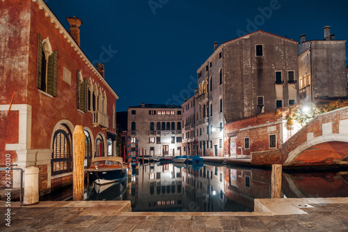 Venice, Italy. colorful buildings on the old night street © ver0nicka