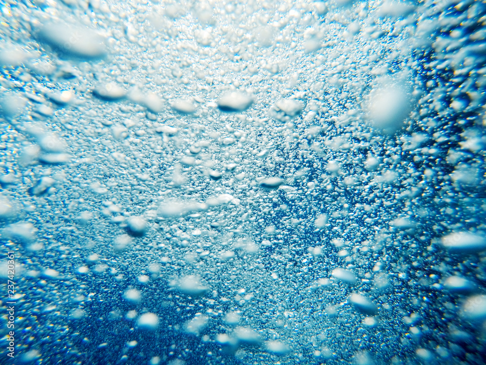 air bubbles rise up out of the water. beautiful natural summer (spring) background