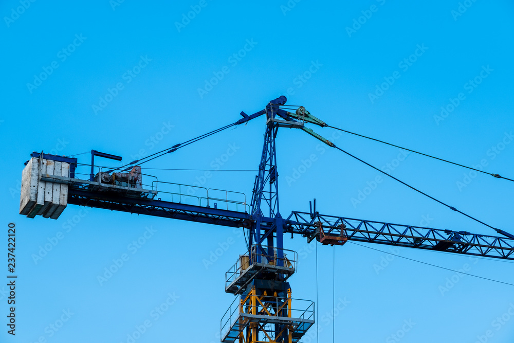 Developing countries rely on machinery for their work.Crane is a machine used in construction.