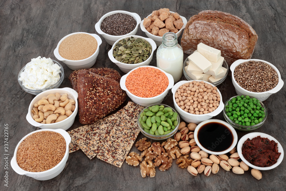 Vegan health food with tofu bean curd, legumes, nuts, seeds, wholegrain bread, miso, soy sauce, vegetables, grains, almond yoghurt and milk. High in antioxidants, omega 3, protein & dietary fibre. Vegan health food with tofu bean curd, legumes, nuts, seeds, wholegrain bread, miso, soy sauce, vegetables, grains, almond yoghurt and milk. High in antioxidants, omega 3, protein & dietary fibre.