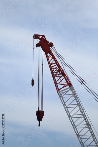 Developing countries rely on machinery for their work.Crane is a machine used in construction.