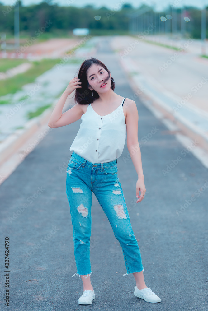 Portrait of beautiful asian woman gold hair outdoor,Happy woman concept,Lifestyle of modern girl,Thailand people Portrait of beautiful asian woman gold hair outdoor,Happy woman concept,Lifestyle of modern girl,Thailand people