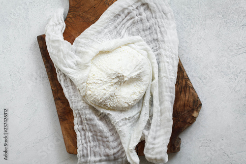 Obraz na plátne Raw Milk yogurt cheese ricotta in muslin cloth probiotic fermented food